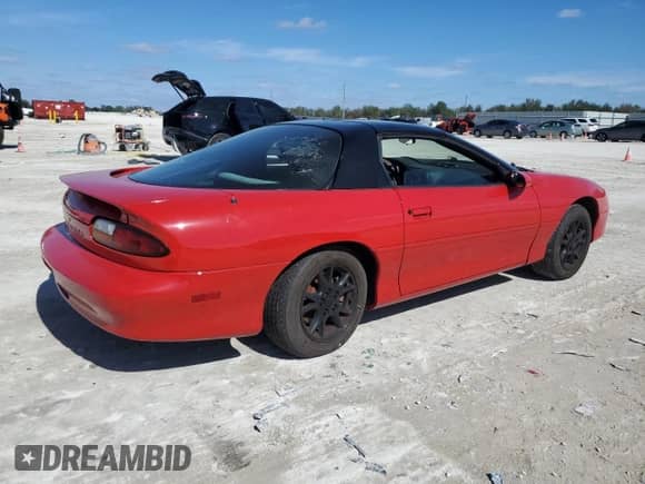 2002 Chevrolet Camaro z VIN 2G1FP22KX22163698, wystawiony jako Copart lot #88935865 z przebiegiem 114 574 mil mil oraz Szkoda całkowita • Salvage title. Historia ofert i sprzedaży dostępna na DreamBid. Obrazek 3.
