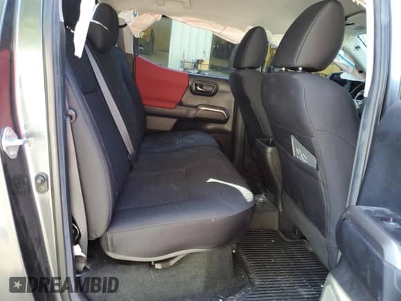 2023 Toyota Tacoma SR z VIN 3TMCZ5AN1PM549871, wystawiony jako Copart lot #68757775 z przebiegiem 34 549 mil mil oraz Szkoda całkowita • Salvage title. Historia ofert i sprzedaży dostępna na DreamBid. Obrazek 10.