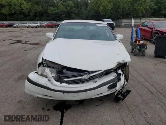 2000 Chevrolet Impala with VIN 2G1WF52EXY9351345, listed as a Copart auction lot 67945205 with 143,791 mi miles and Salvage title. Bid and sale history available at DreamBid. Image 5.