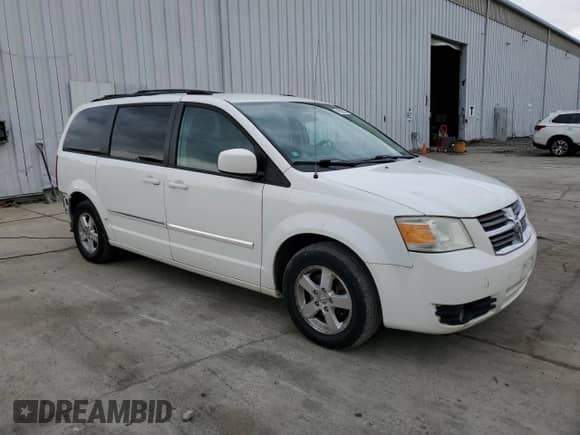 2009 Dodge Grand Caravan SXT with VIN 2D8HN54169R584641, listed as a Copart auction lot 49898095 with 201,458 mi miles and Salvage title. Bid and sale history available at DreamBid. Image 4.