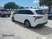 2025 Toyota Sienna XLE with VIN 5TDYRKEC4SS267312, listed as a IAAI auction lot 42981351 with 1,962 mi miles and . Bid and sale history available at DreamBid. Image 3.