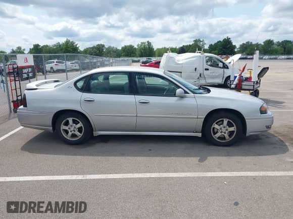 2004 Chevrolet Impala LS with VIN 2G1WH52K449252935, listed as a IAAI auction lot 42776265 with 176,789 mi miles and . Bid and sale history available at DreamBid. Image 13.