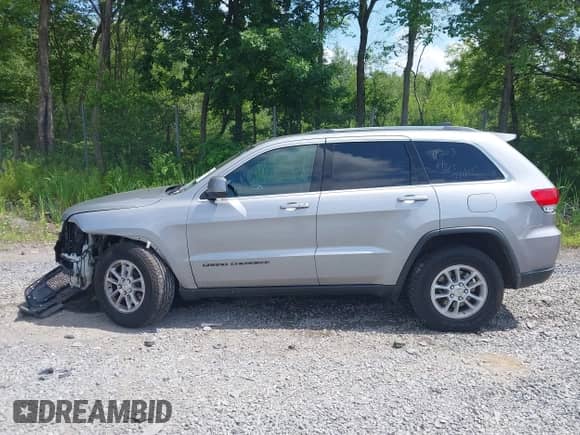 2019 Jeep Grand Cherokee Altitude with VIN 1C4RJFAG4KC735729, listed as a IAAI auction lot 42700648 with 104,373 mi miles and . Bid and sale history available at DreamBid. Image 14.
