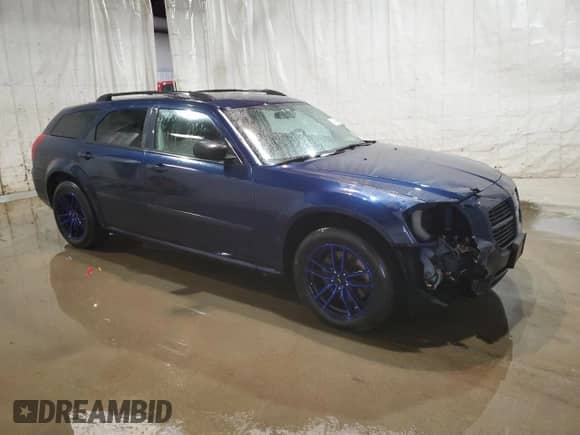 2005 Dodge Magnum SXT with VIN 2D4GZ48V95H537435, listed as a Copart auction lot 74198134 with 84,164 mi miles and Salvage title. Bid and sale history available at DreamBid. Image 4.