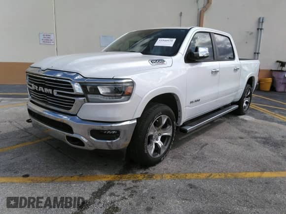 2021 Ram 1500 Laramie z VIN 1C6SRFJM5MN648372, wystawiony jako IAAI lot #41946610 z przebiegiem 10 161 mil mil oraz . Historia ofert i sprzedaży dostępna na DreamBid. Obrazek 2.