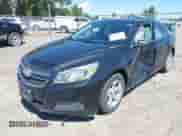 2013 Chevrolet Malibu LS with VIN 1G11B5SA5DF165779, listed as a IAAI auction lot 42907632 with 100,927 mi miles and . Bid and sale history available at DreamBid. Image 2.