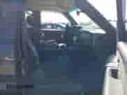 2004 Chevrolet Avalanche Z71 z VIN 3GNEK12T14G117298, wystawiony jako IAAI lot #42600262 z przebiegiem 209 889 mil mil oraz . Historia ofert i sprzedaży dostępna na DreamBid. Obrazek 5.