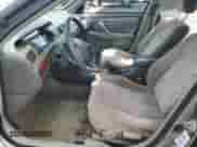 1997 Toyota Camry LE z VIN 4T1BF22K7VU028360, wystawiony jako Copart lot #72048725 z przebiegiem 232 556 mil mil oraz Szkoda całkowita • Salvage title. Historia ofert i sprzedaży dostępna na DreamBid. Obrazek 7.