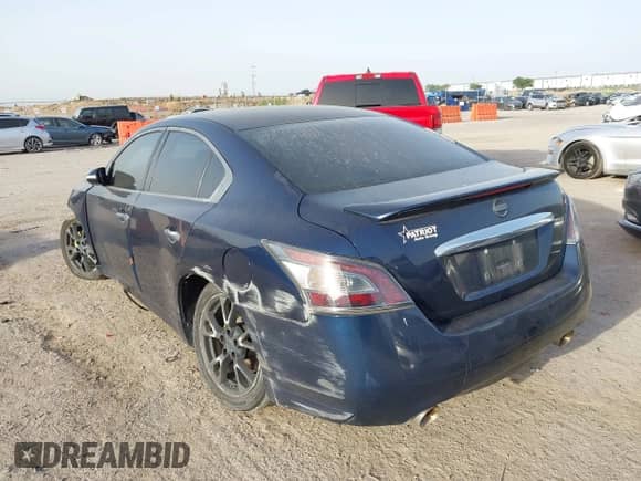 2014 Nissan Maxima SV z VIN 1N4AA5AP0EC907305, wystawiony jako IAAI lot #42262072 z przebiegiem 130 541 mil mil oraz . Historia ofert i sprzedaży dostępna na DreamBid. Obrazek 3.