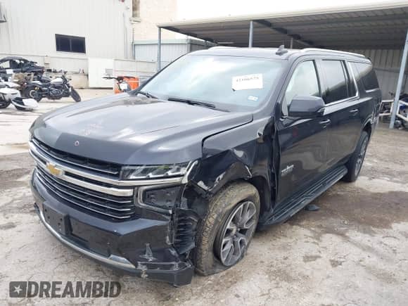 2022 Chevrolet Suburban LT z VIN 1GNSCCKD8NR301806, wystawiony jako IAAI lot #42106575 z przebiegiem 61 155 mil mil oraz . Historia ofert i sprzedaży dostępna na DreamBid. Obrazek 2.