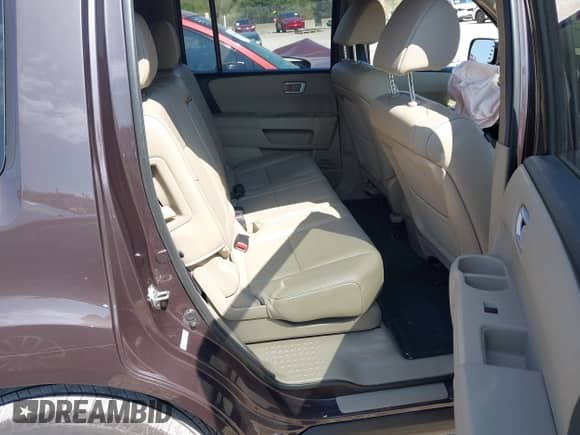 2013 Honda Pilot EX-L with VIN 5FNYF4H57DB082731, listed as a IAAI auction lot 43203205 with 96,017 mi miles and . Bid and sale history available at DreamBid. Image 8.