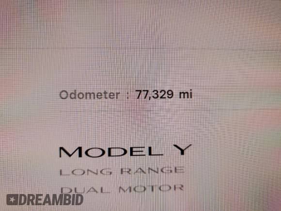 2021 Tesla Model Y Long Range with VIN 5YJYGDEE7MF206059, listed as a Copart auction lot 80559965 with 77,329 mi miles and Salvage title. Bid and sale history available at DreamBid. Image 9.