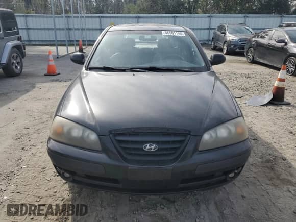 2004 Hyundai Elantra GT z VIN KMHDN56D94U122795, wystawiony jako Copart lot #46501145 z przebiegiem 139 258 mil mil oraz Szkoda całkowita • Salvage title. Historia ofert i sprzedaży dostępna na DreamBid. Obrazek 5.