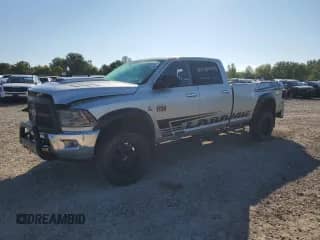 2010 Dodge 2500 Laramie with VIN 3D7UT2CLXAG110132, listed as a Copart auction lot 70708365 with 135,243 mi miles and Salvage title. Bid and sale history available at DreamBid. Image 1.