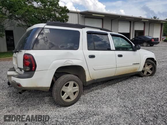 2003 Chevrolet TrailBlazer EXT LT z VIN 1GNET16S736105087, wystawiony jako Copart lot #60861625 z przebiegiem 310 608 mil mil oraz Szkoda całkowita • Salvage title. Historia ofert i sprzedaży dostępna na DreamBid. Obrazek 3.