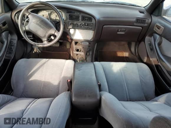 1993 Toyota Camry with VIN 4T1VK12E7PU093838, listed as a Copart auction lot 45171825 with 207,882 mi miles and Salvage title. Bid and sale history available at DreamBid. Image 8.