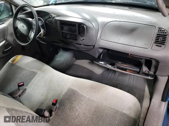 1997 Ford F-150 XL with VIN 1FTDF0720VKA28092, listed as a Copart auction lot 87849295 with 195,813 mi miles and Salvage title. Bid and sale history available at DreamBid. Image 8.