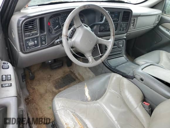 2002 GMC Sierra 1500 Denali z VIN 2GTFK69U321309689, wystawiony jako Copart lot #60267695 z przebiegiem 351 508 mil mil oraz Czysty tytuł • Clean title. Historia ofert i sprzedaży dostępna na DreamBid. Obrazek 8.