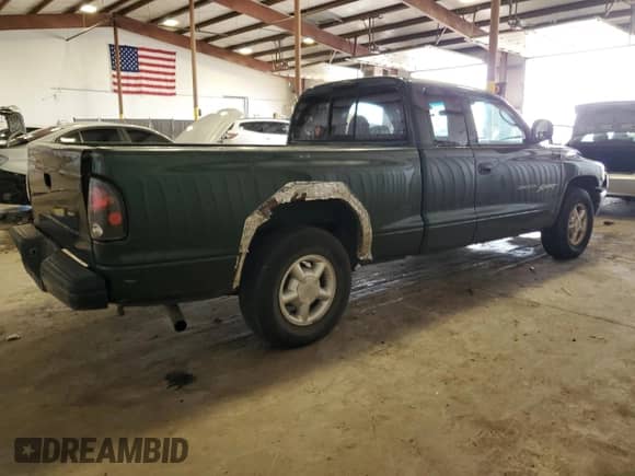 2000 Dodge Dakota with VIN 1B7GL22X1YS563179, listed as a Copart auction lot 60956035 with 221,795 mi miles and Salvage title. Bid and sale history available at DreamBid. Image 3.