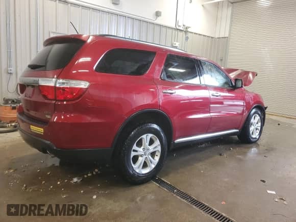 2013 Dodge Durango Crew with VIN 1C4RDJDG4DC660037, listed as a Copart auction lot 87818265 with Not provided miles and Salvage title. Bid and sale history available at DreamBid. Image 3.