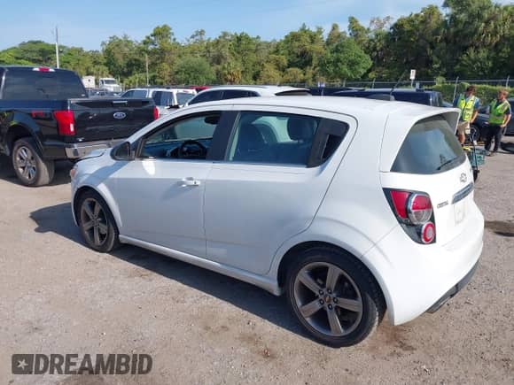 2015 Chevrolet Sonic RS with VIN 1G1JG6SB2F4185485, listed as a IAAI auction lot 42109108 with 63,782 mi miles and . Bid and sale history available at DreamBid. Image 3.