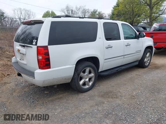 2014 Chevrolet Suburban LTZ with VIN 1GNSKKE77ER152002, listed as a IAAI auction lot 41930865 with 159,393 mi miles and . Bid and sale history available at DreamBid. Image 4.