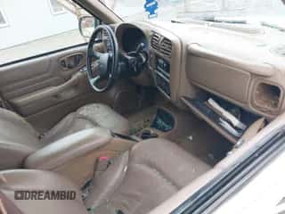 1999 Chevrolet Blazer LS с VIN 1GNDT13W7X2107938, выставлен на аукционе IAAI как лот 43399398 с пробегом 132 420 миль миль и . История ставок и продаж доступна на DreamBid. Изображение 5.