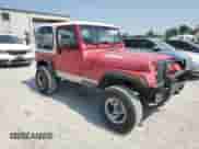 1992 Jeep Wrangler with VIN 2J4FY29S1NJ527182, listed as a Copart auction lot 71387974 with 228,406 mi miles and Clean title. Bid and sale history available at DreamBid. Image 4.