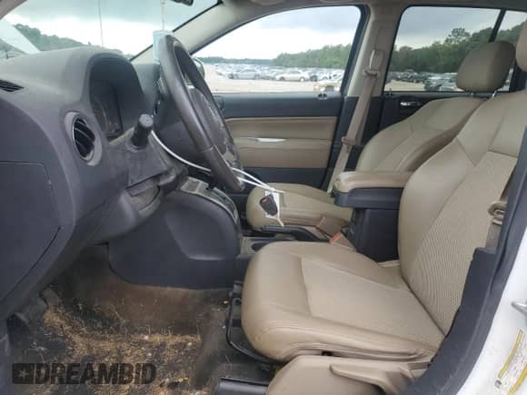 2017 Jeep Compass Latitude with VIN 1C4NJCEA7HD115169, listed as a Copart auction lot 65231945 with 169,540 mi miles and Salvage title. Bid and sale history available at DreamBid. Image 7.