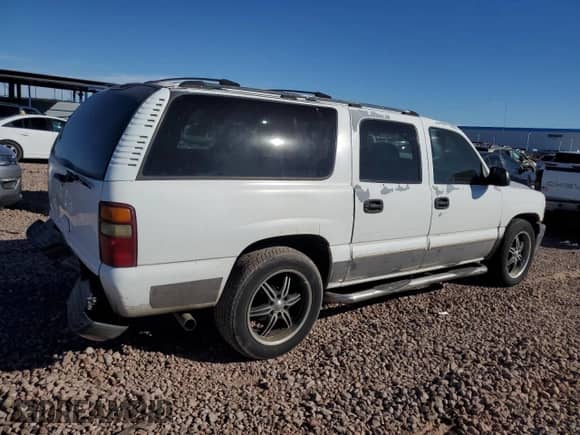 2001 Chevrolet Suburban LS z VIN 1GNFK16T71J233937, wystawiony jako Copart lot #76956504 z przebiegiem 357 839 mil mil oraz Szkoda całkowita • Salvage title. Historia ofert i sprzedaży dostępna na DreamBid. Obrazek 3.