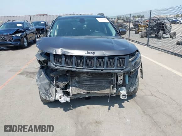 2019 Jeep Compass Altitude z VIN 3C4NJCBB5KT726882, wystawiony jako IAAI lot #42662008 z przebiegiem 100 634 mil mil oraz . Historia ofert i sprzedaży dostępna na DreamBid. Obrazek 13.