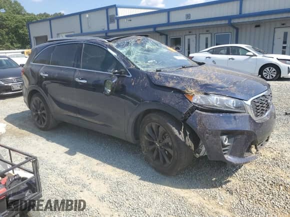 2020 Kia Sorento EX z VIN 5XYPH4A57LG696413, wystawiony jako Copart lot #83858195 z przebiegiem 54 909 mil mil oraz Szkoda całkowita • Salvage title. Historia ofert i sprzedaży dostępna na DreamBid. Obrazek 4.