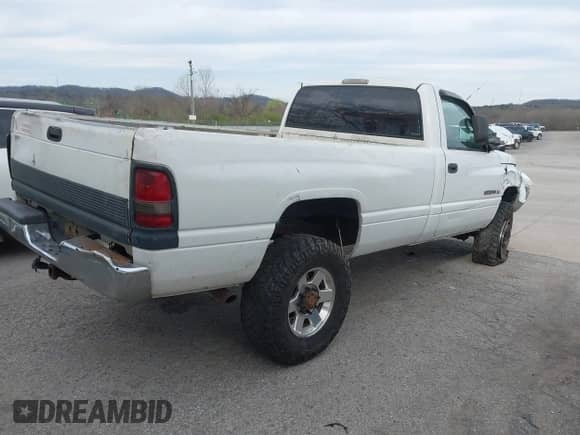 2002 Dodge 2500 with VIN 3B7KF26Z42M309477, listed as a IAAI auction lot 41822998 with 201,678 mi miles and . Bid and sale history available at DreamBid. Image 4.