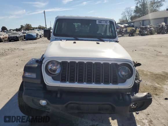 2024 Jeep Wrangler Sport S with VIN 1C4PJXDN7RW243762, listed as a Copart auction lot 77188874 with 18,935 mi miles and Salvage title. Bid and sale history available at DreamBid. Image 5.