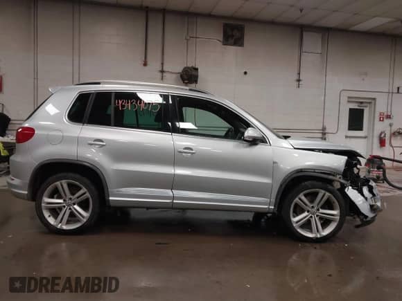 2016 Volkswagen Tiguan SEL with VIN WVGBV7AX0GW073628, listed as a IAAI auction lot 43434075 with 134,208 mi miles and . Bid and sale history available at DreamBid. Image 14.
