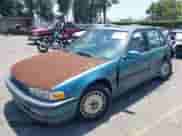 1991 Honda Accord EX z VIN JHMCB7560MC063583, wystawiony jako IAAI lot #42563870 z przebiegiem 226 798 mil mil oraz . Historia ofert i sprzedaży dostępna na DreamBid. Obrazek 19.