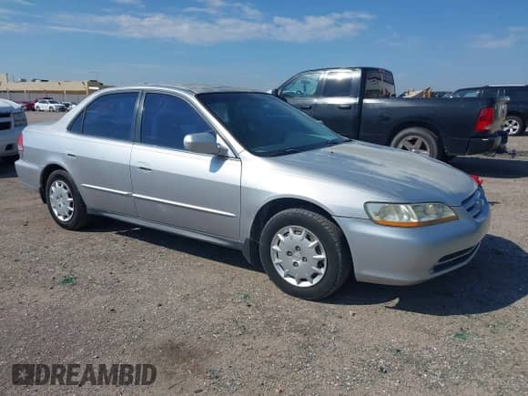 2001 Honda Accord LX with VIN JHMCG56431C014909, listed as a IAAI auction lot 43228547 with 307,350 mi miles and . Bid and sale history available at DreamBid. Image 1.