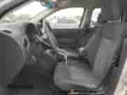 2011 Jeep Compass with VIN 1J4NT1FA6BD173305, listed as a Copart auction lot 87358405 with 112,019 mi miles and Salvage title. Bid and sale history available at DreamBid. Image 7.