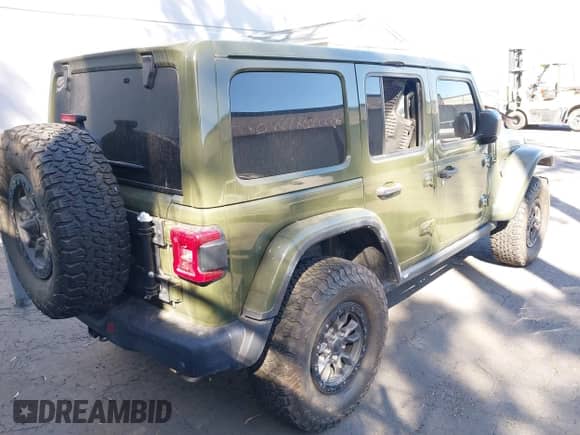 2022 Jeep Wrangler Unlimited Rubicon 392 with VIN 1C4JJXSJ5NW208332, listed as a IAAI auction lot 41517128 with Not provided miles and . Bid and sale history available at DreamBid. Image 4.
