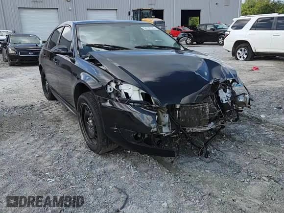 2013 Chevrolet Impala Police с VIN 2G1WD5E35D1220557, выставлен на аукционе Copart как лот 62737725 с пробегом Не указан миль и Списание • Salvage title. История ставок и продаж доступна на DreamBid. Изображение 13.