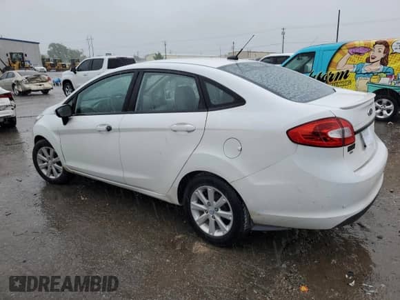 2012 Ford Fiesta SE with VIN 3FADP4BJ6CM126249, listed as a Copart auction lot 55529395 with 119,770 mi miles and Salvage title. Bid and sale history available at DreamBid. Image 2.