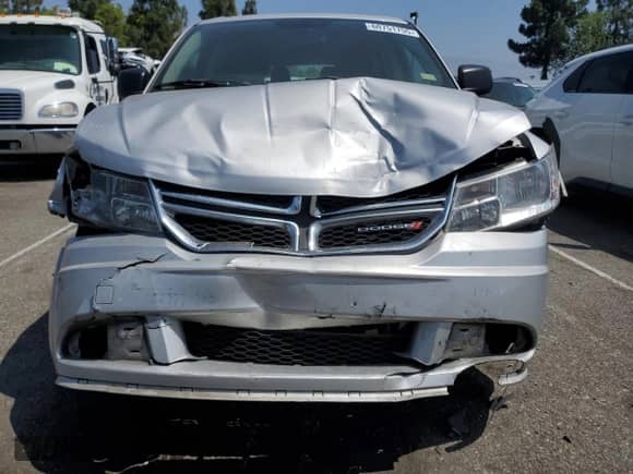 2014 Dodge Journey American Value with VIN 3C4PDCAB3ET171257, listed as a Copart auction lot 60751755 with 155,663 mi miles and Salvage title. Bid and sale history available at DreamBid. Image 5.