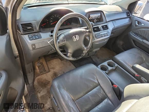 2007 Honda Odyssey EX-L z VIN 5FNRL38697B456826, wystawiony jako Copart lot #85890275 z przebiegiem 287 303 mil mil oraz Czysty tytuł • Clean title. Historia ofert i sprzedaży dostępna na DreamBid. Obrazek 8.