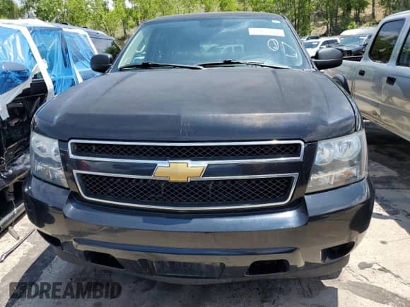 2013 Chevrolet Tahoe Commercial с VIN 1GNSK2E02DR342419, выставлен на аукционе Copart как лот 57908885 с пробегом 76 486 миль миль и Списание • Salvage title. История ставок и продаж доступна на DreamBid. Изображение 5.