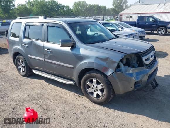 2010 Honda Pilot Touring with VIN 5FNYF4H88AB012001, listed as a IAAI auction lot 42635771 with 287,115 mi miles and . Bid and sale history available at DreamBid. Image 1.