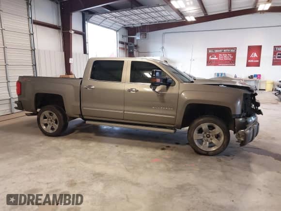 2017 Chevrolet Silverado 1500 LTZ z VIN 3GCUKSEJ4HG328926, wystawiony jako IAAI lot #41125958 z przebiegiem 248 071 mil mil oraz . Historia ofert i sprzedaży dostępna na DreamBid. Obrazek 14.