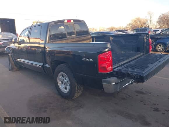 2008 Dodge Dakota Laramie with VIN 1D7HW58N18S593890, listed as a IAAI auction lot 41762135 with 109,669 mi miles and . Bid and sale history available at DreamBid. Image 3.