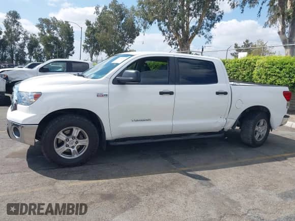 2013 Toyota Tundra with VIN 5TFDY5F16DX301294, listed as a IAAI auction lot 43190182 with 219,627 mi miles and . Bid and sale history available at DreamBid. Image 14.