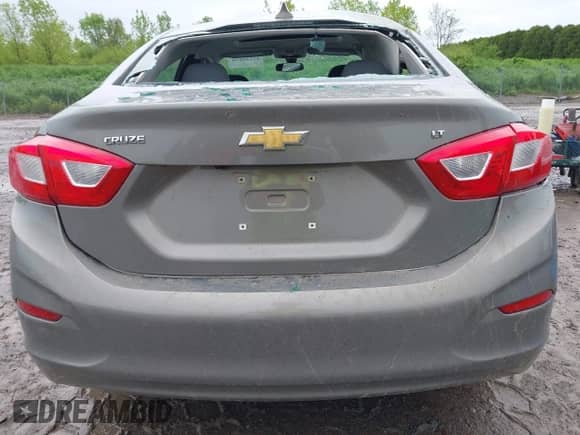 2017 Chevrolet Cruze LT z VIN 3G1BE5SM0HS560704, wystawiony jako IAAI lot #42342079 z przebiegiem 119 153 mil mil oraz . Historia ofert i sprzedaży dostępna na DreamBid. Obrazek 16.