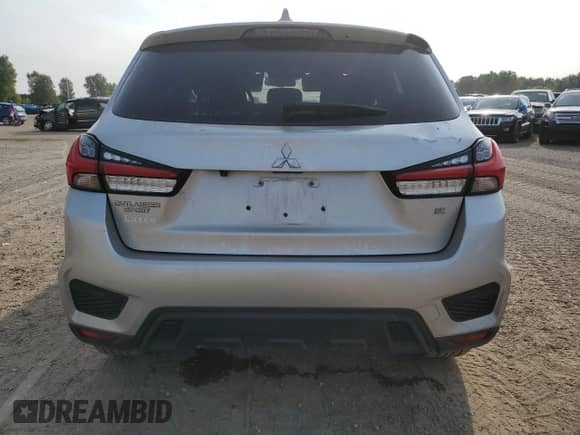 2020 Mitsubishi Outlander SE z VIN JA4AP4AU9LU030565, wystawiony jako Copart lot #80143545 z przebiegiem 84 002 mil mil oraz Nie do naprawy • Non repairable. Historia ofert i sprzedaży dostępna na DreamBid. Obrazek 6.